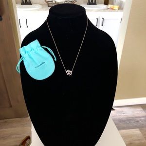 Tiffany & Co Loving Heart interlocking pendant